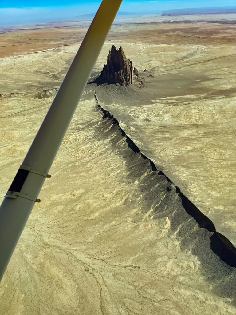 Shiprock volcanic plug and dike, from the cockpit.